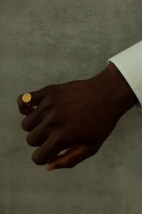 THE HAITI Crest Signet Ring With Black Star Sapphires