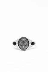 THE HAITI Crest Signet Ring With Black Star Sapphires