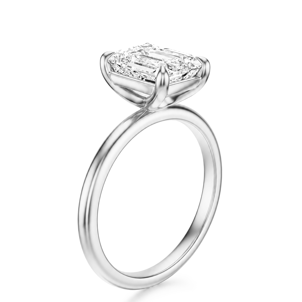 THE ASTER Emerald Solitaire Ring