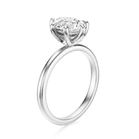 THE ASTER Pear Solitaire Ring