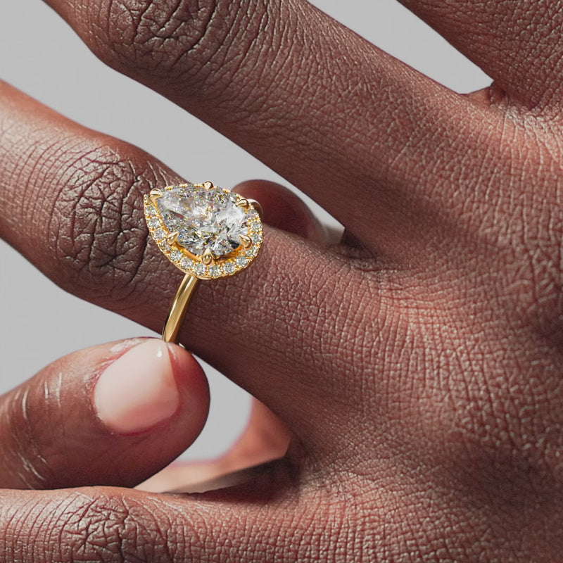 THE NADEAN Pear Halo Ring