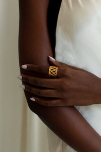 THE WOVEN Cowrie Ring